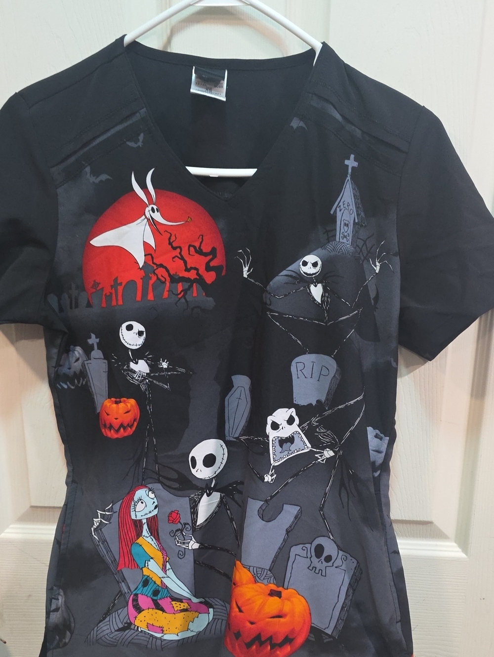 Nightmare-Inspired Women's Halloween Top in Black with Red and Orange Accents